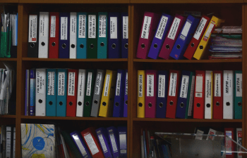 Folders in a bookshelf